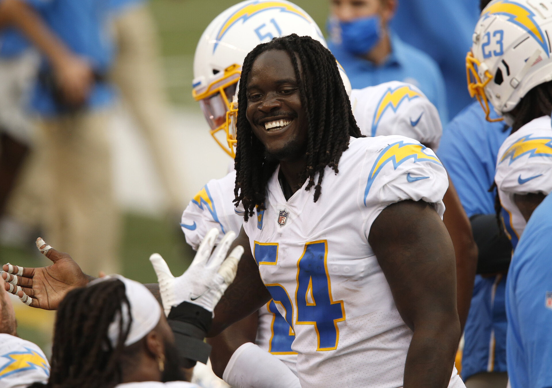 Los Angeles Chargers defensive end Melvin Ingram (54) celebrates after his fourth quarter interception against the Cincinnati Bengals during the second half at Paul Brown Stadium.