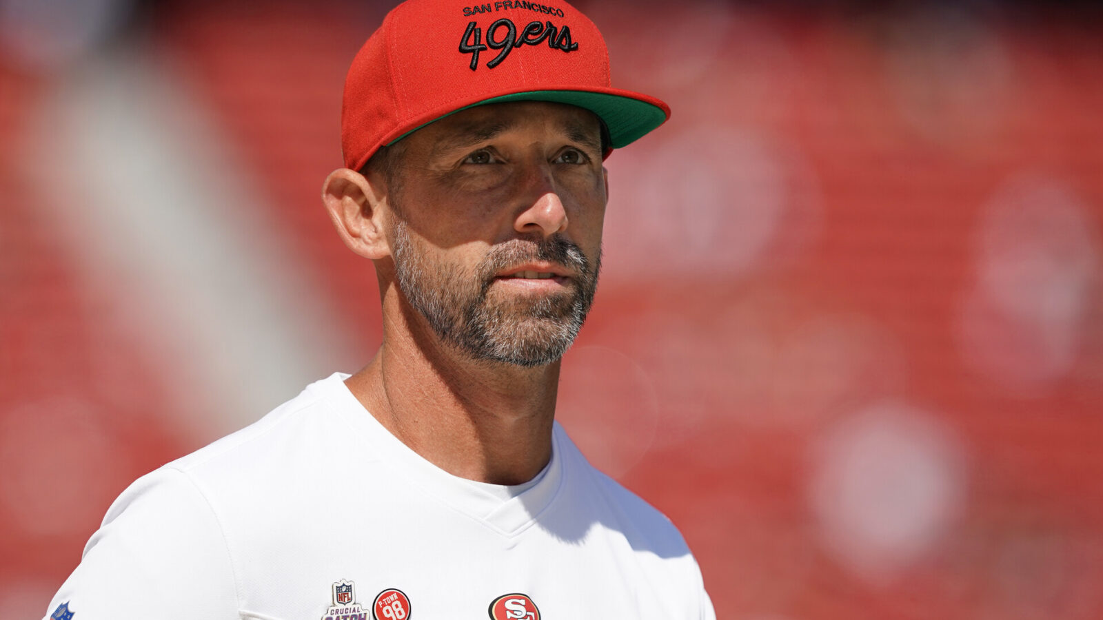 San Francisco 49ers head coach Kyle Shanahan walks on the field before the game against the Seattle Seahawks at Levi's Stadium.