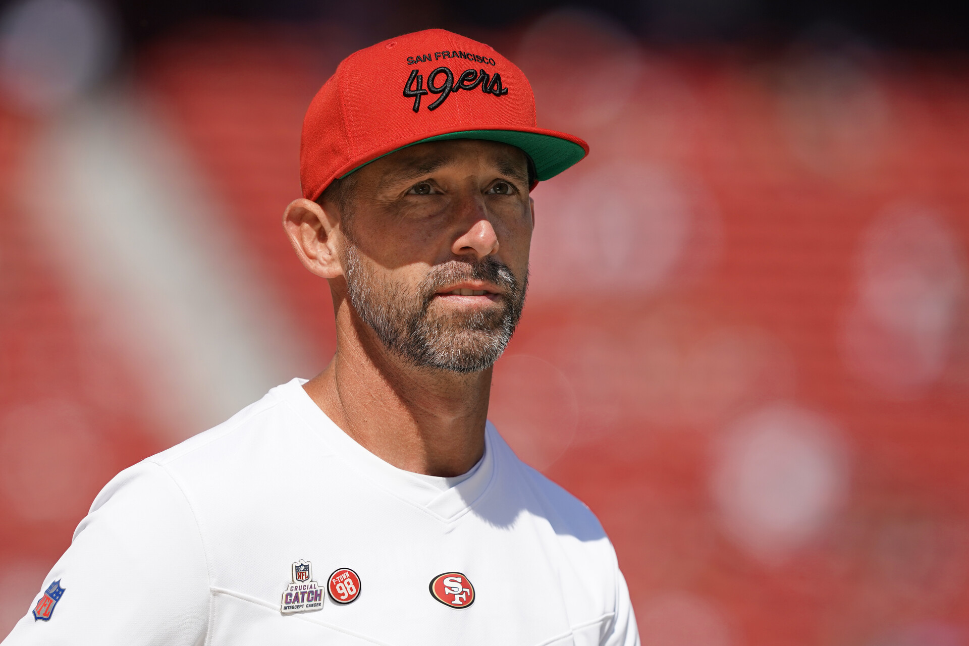 San Francisco 49ers head coach Kyle Shanahan walks on the field before the game against the Seattle Seahawks at Levi's Stadium.