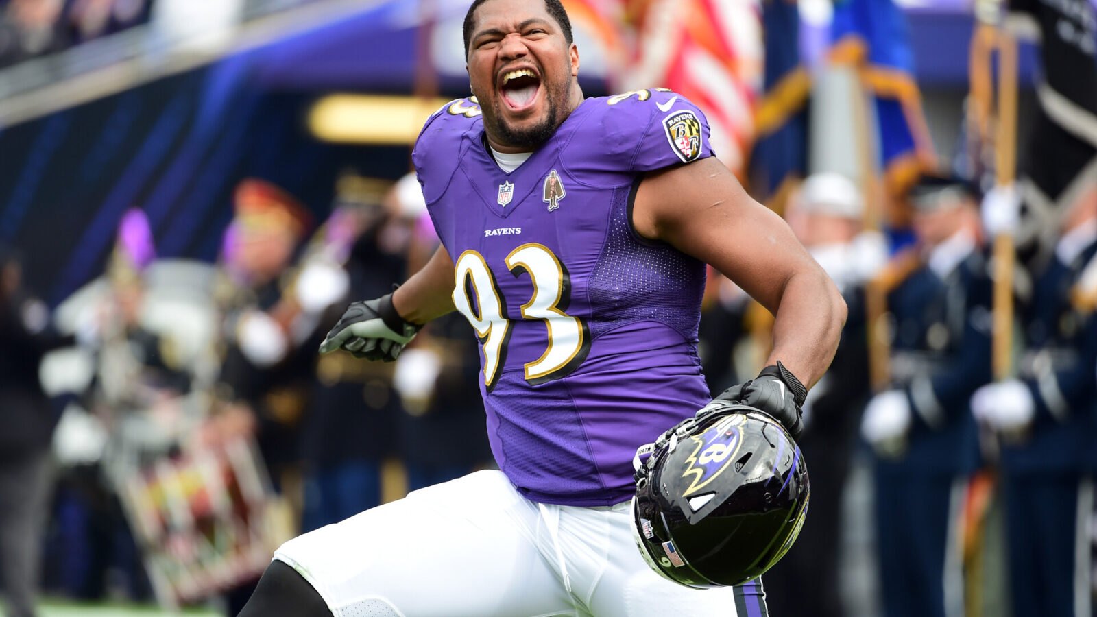 Baltimore Ravens defensive end Calais Campbell (93) runs onto the field prior to the game against the Cincinnati Bengals at M&T Bank Stadium.