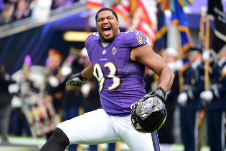 Baltimore Ravens defensive end Calais Campbell (93) runs onto the field prior to the game against the Cincinnati Bengals at M&T Bank Stadium.