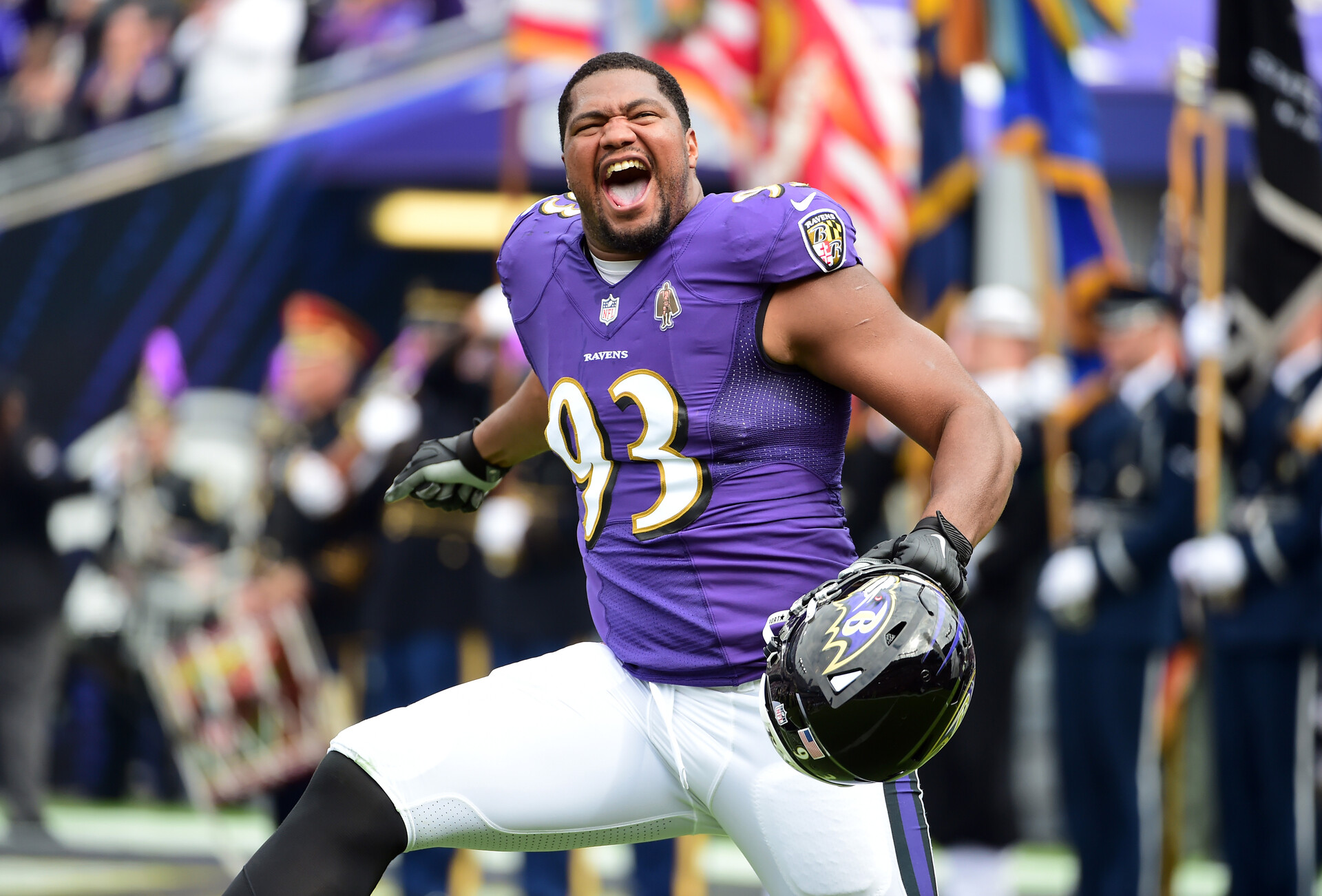 Baltimore Ravens defensive end Calais Campbell (93) runs onto the field prior to the game against the Cincinnati Bengals at M&T Bank Stadium.