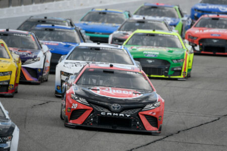 NASCAR Cup Series driver Christopher Bell (20) races in the pack during the Ambetter 301 at New Hampshire Motor Speedway.