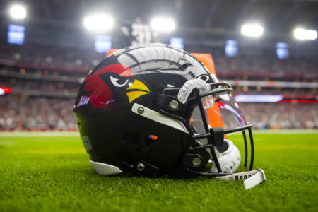 Oct 9, 2022; Glendale, Arizona, USA; Detailed view of a black Arizona Cardinals helmet on the field at State Farm Stadium.