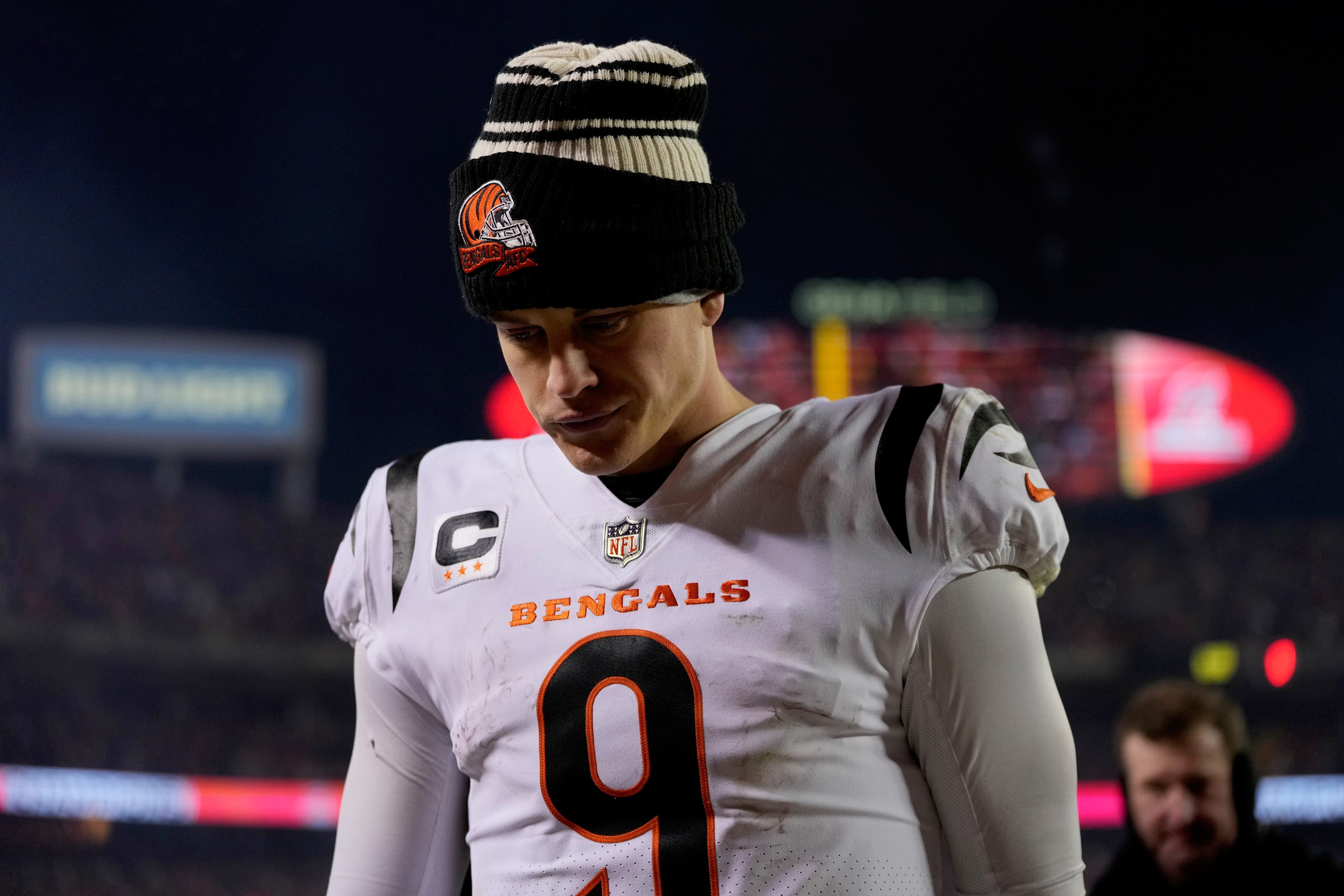 Cincinnati Bengals Joe Burrow walks off the field after the Kansas City Chief beat the Bengals 23-20 for the AFC Championship at GEHA Field at Arrowhead Stadium in Kansas City, Missouri Sunday January 29, 2023.