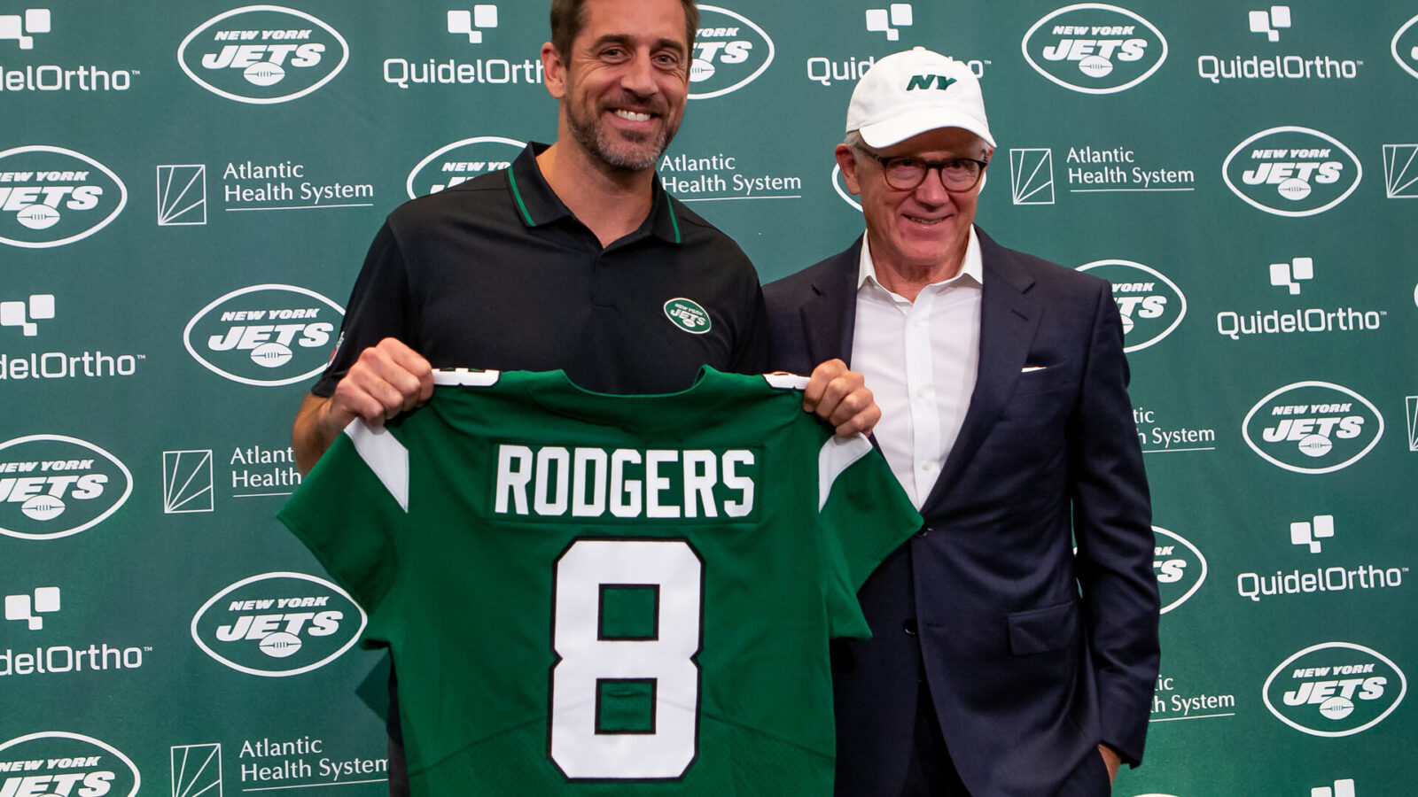 Apr 26, 2023; Florham Park, NJ, USA; New York Jets quarterback Aaron Rodgers (left) and owner Woody Johnson pose for a photo during the introductory press conference at Atlantic Health Jets Training Center.
