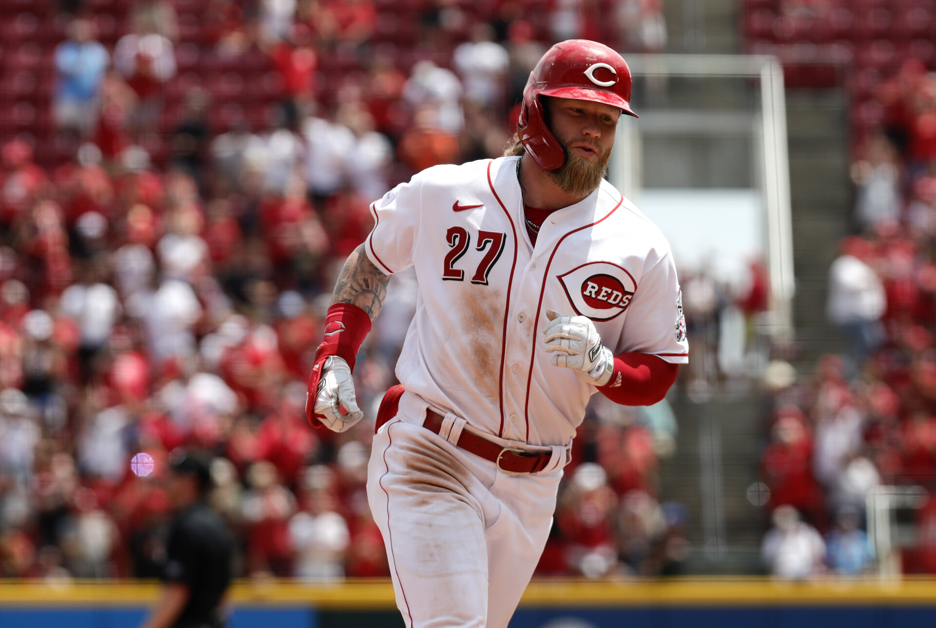 Cincinnati Reds right fielder Jake Fraley (27) runs the bases after hitting a two-run home run against the Colorado Rockies during the eighth inning at Great American Ball Park.