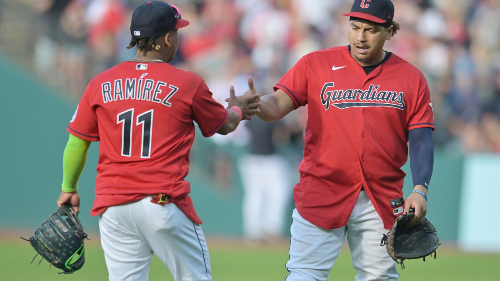 Jun 24, 2023; Cleveland, Ohio, USA; Cleveland Guardians third baseman Jose Ramirez (11) and first baseman Josh Naylor (22) celebrate after the Guardians beat the Milwaukee Brewers at Progressive Field.