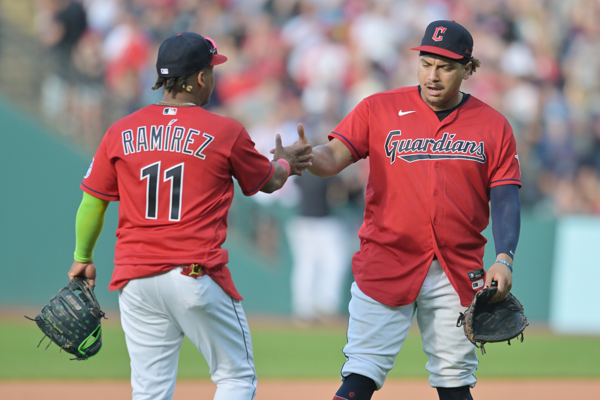 Jun 24, 2023; Cleveland, Ohio, USA; Cleveland Guardians third baseman Jose Ramirez (11) and first baseman Josh Naylor (22) celebrate after the Guardians beat the Milwaukee Brewers at Progressive Field.