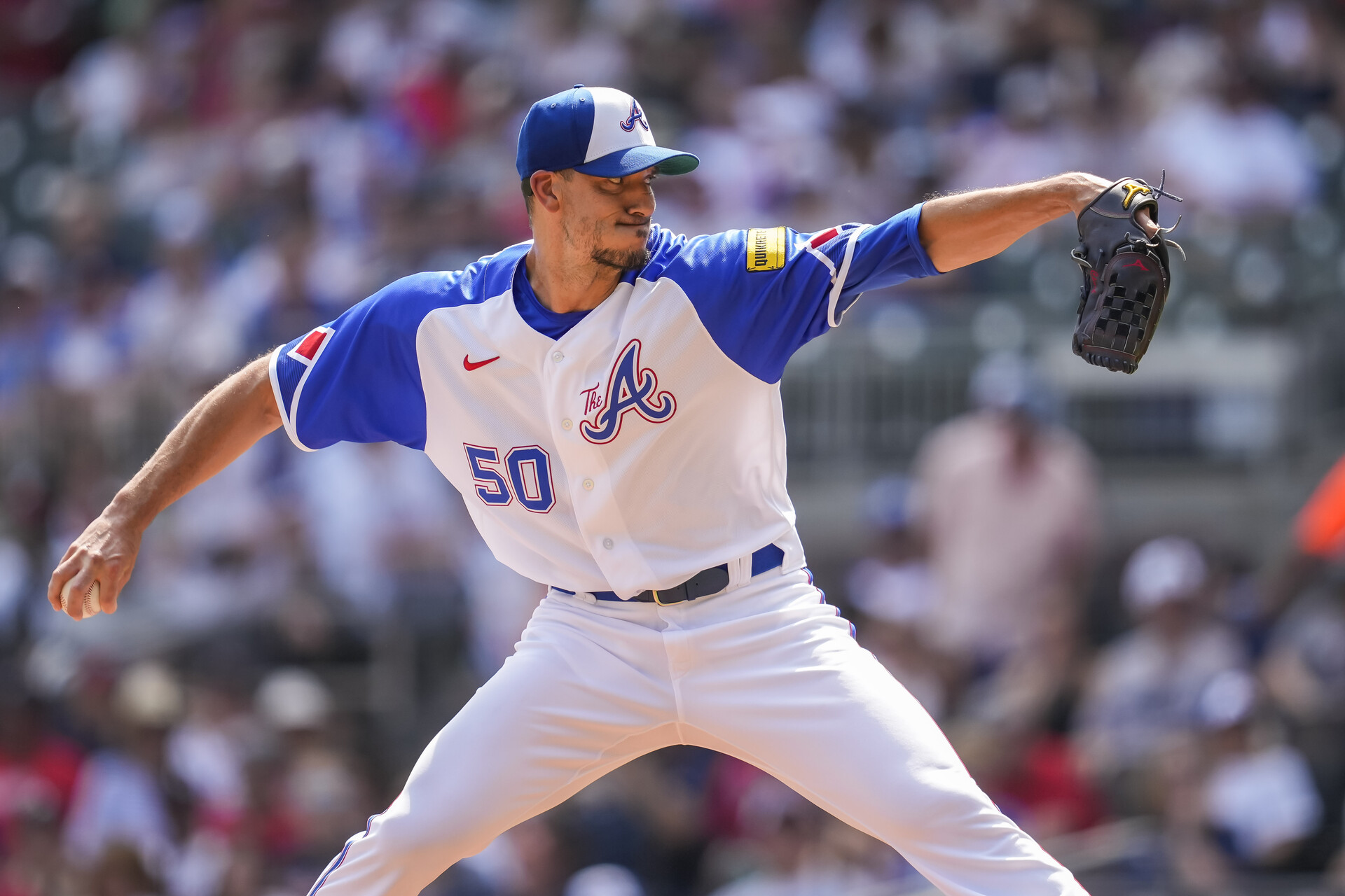 Jul 1, 2023; Cumberland, Georgia, USA; Atlanta Braves starting pitcher Charlie Morton (50) pitches against the Miami Marlins during the first inning at Truist Park.
