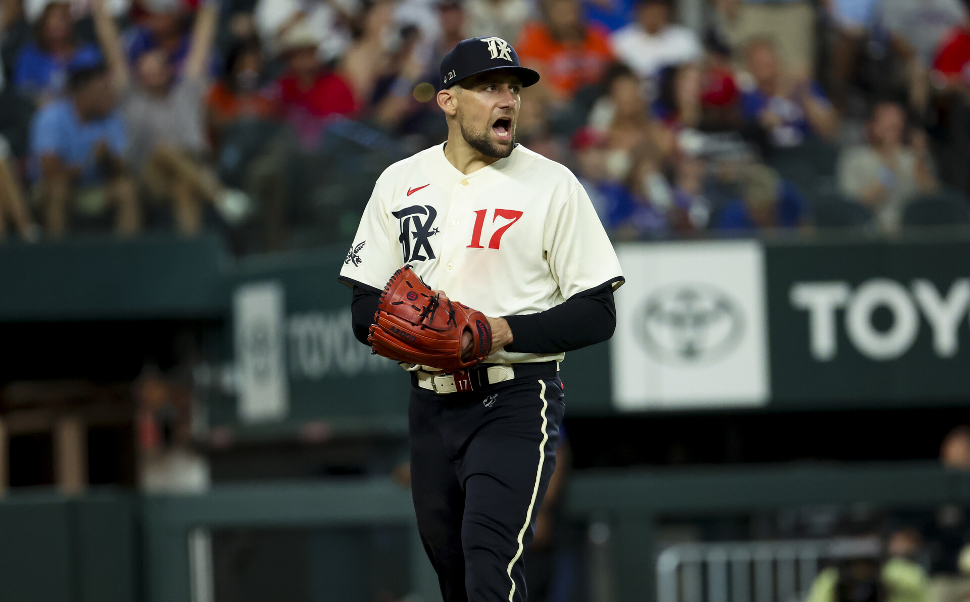 Jul 1, 2023; Arlington, Texas, USA; Texas Rangers starting pitcher Nathan Eovaldi (17) reacts after the seventh inning against the Houston Astros at Globe Life Field.