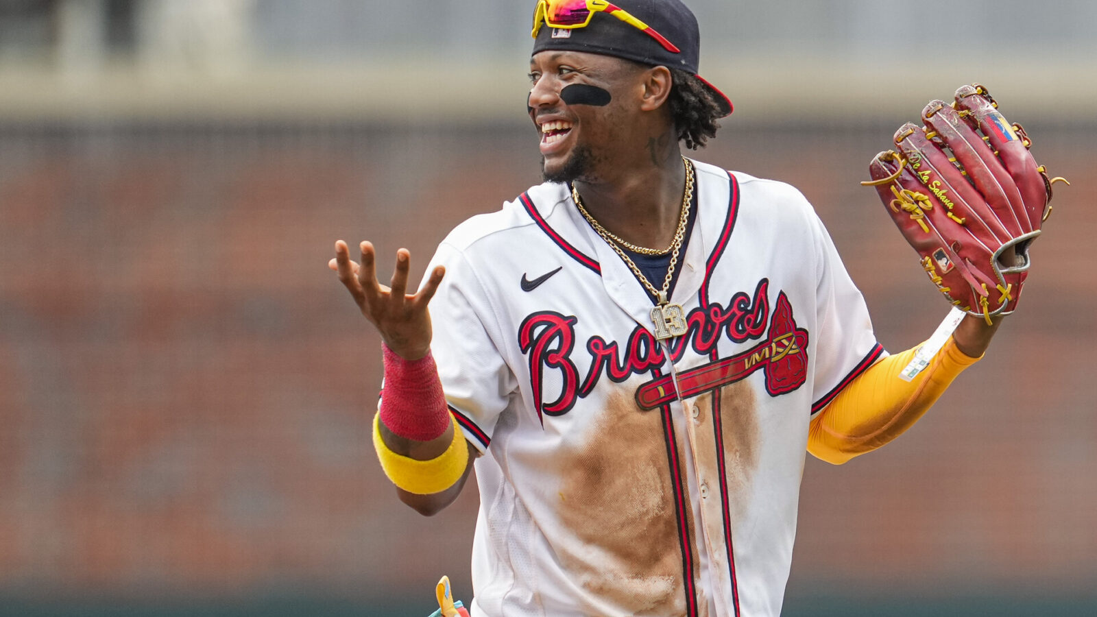 Jul 2, 2023; Cumberland, Georgia, USA; Atlanta Braves right fielder Ronald Acuna Jr. (13) reacts after the Braves defeated the Miami Marlins at Truist Park.
