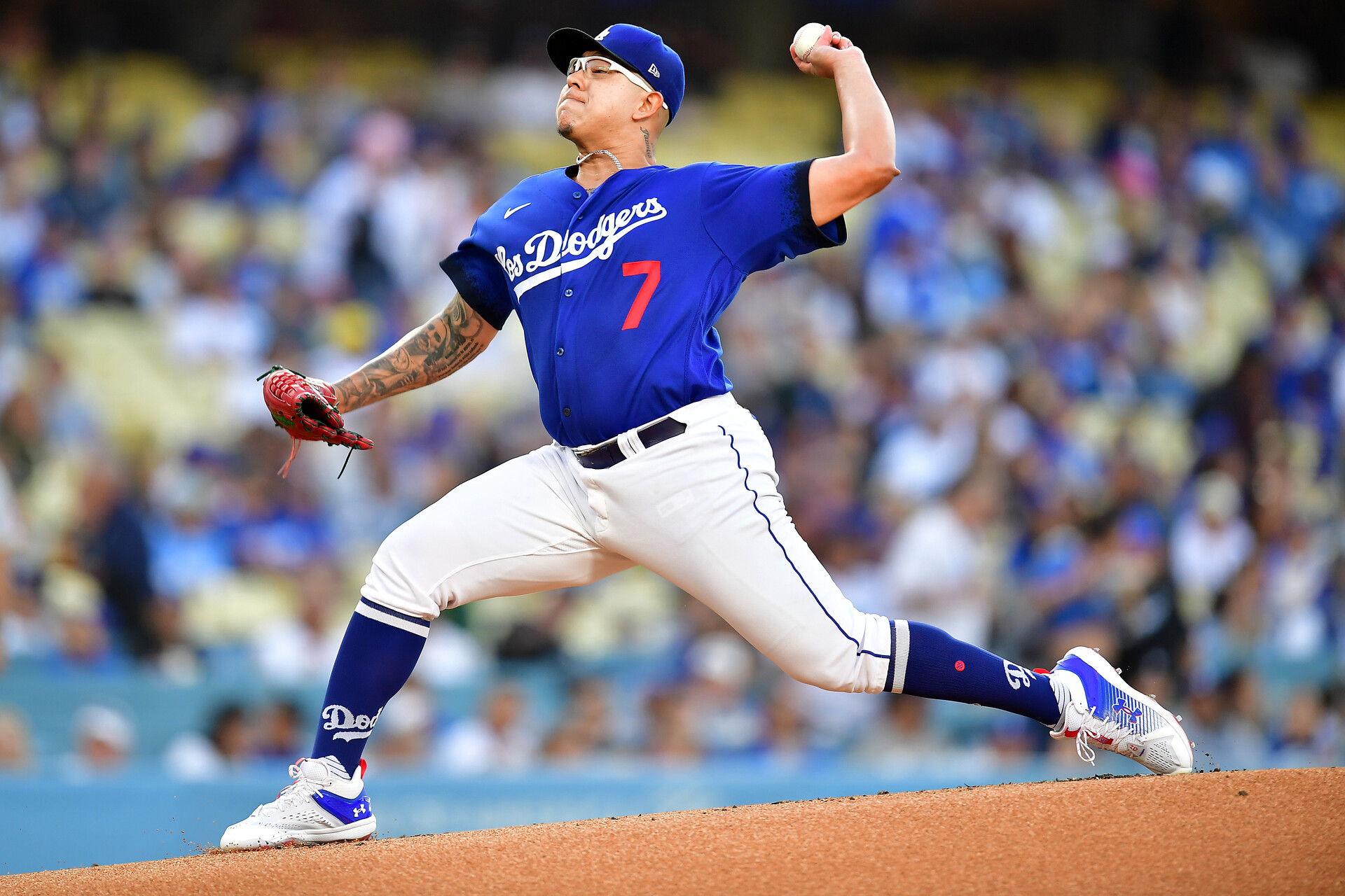 Jul 6, 2023; Los Angeles, California, USA; Los Angeles Dodgers starting pitcher Julio Urias (7) throws against the Pittsburgh Pirates during the first inning at Dodger Stadium.