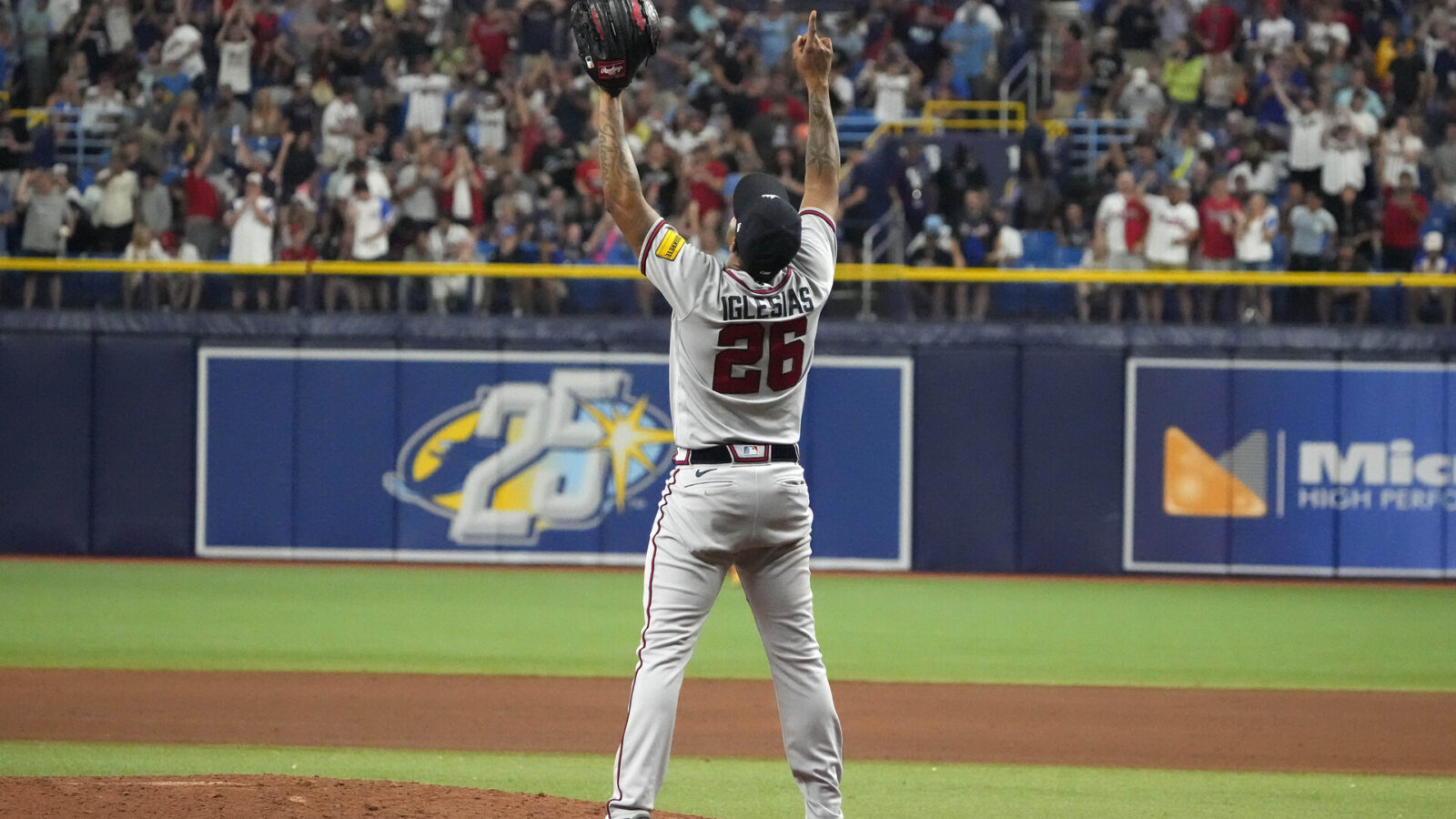 Jul 7, 2023; St. Petersburg, Florida, USA; Atlanta Braves relief pitcher Raisel Iglesias (26) celebrates after the defeating the Tampa Bay Rays at Tropicana Field.