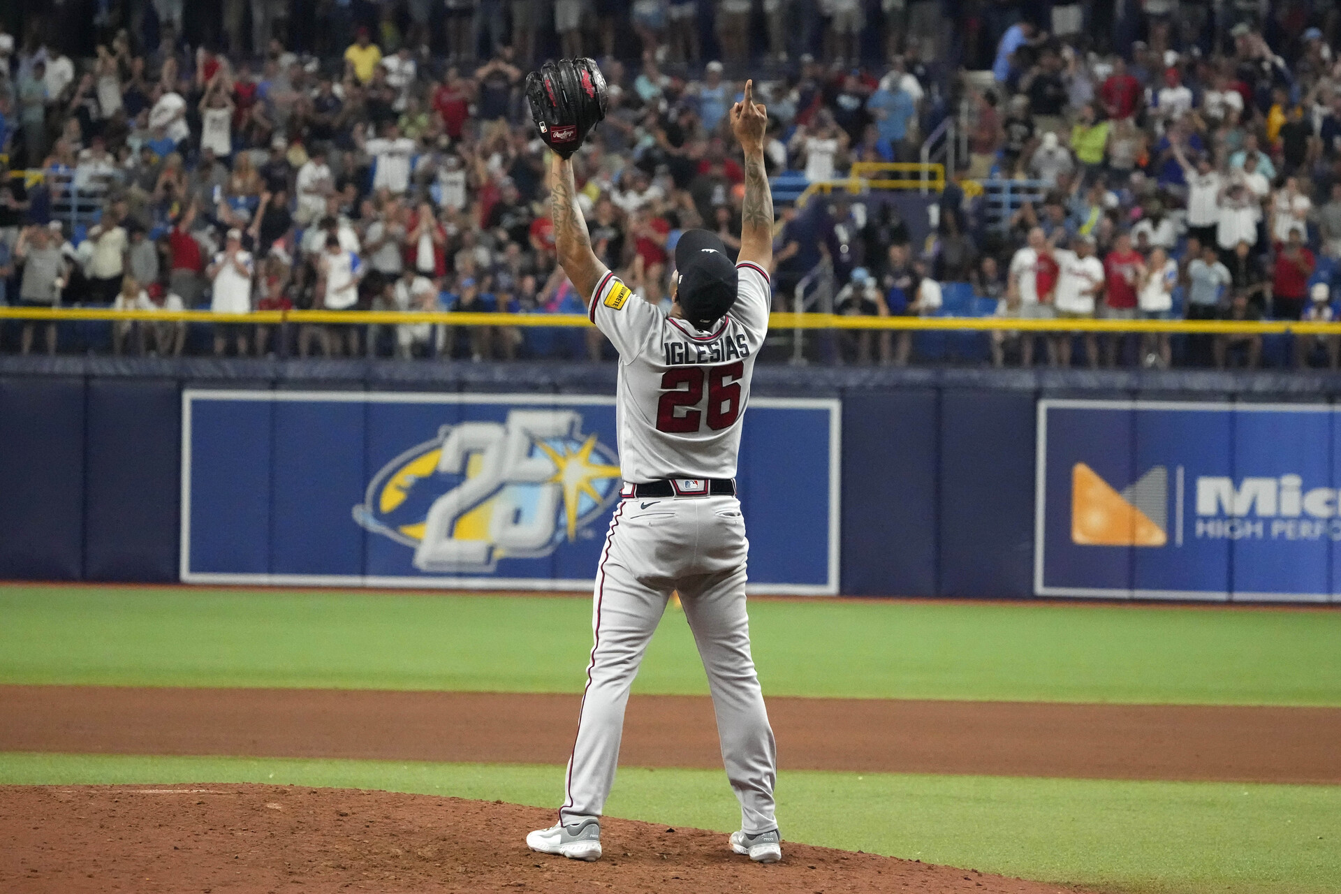 Jul 7, 2023; St. Petersburg, Florida, USA; Atlanta Braves relief pitcher Raisel Iglesias (26) celebrates after the defeating the Tampa Bay Rays at Tropicana Field.
