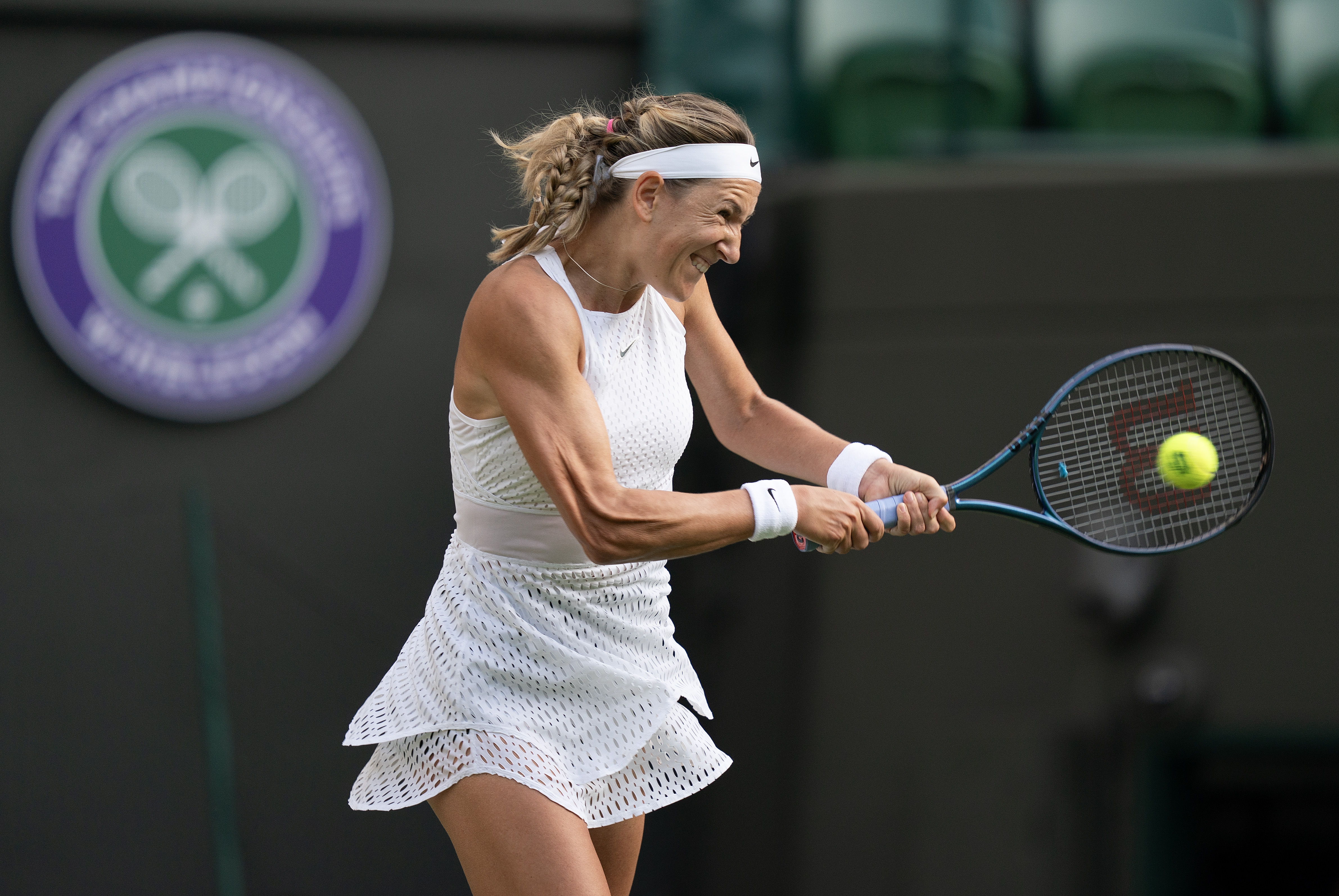Jul 9, 2023; London, United Kingdom; Victoria Azarenka returns a shot during her match against Elina Svitolina (UKR) on day seven at the All England Lawn Tennis and Croquet Club.