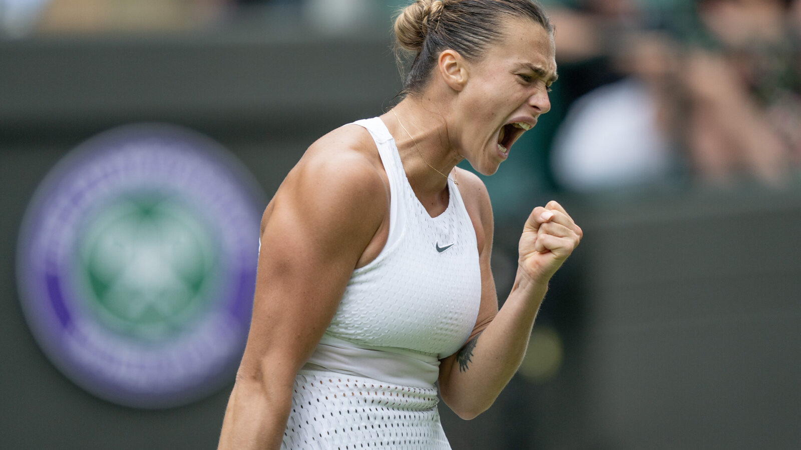 Jul 12, 2023; London, United Kingdom; Aryna Sabalenka celebrates winning her match against Madison Keys (USA) on day ten of Wimbledon at the All England Lawn Tennis and Croquet Club.