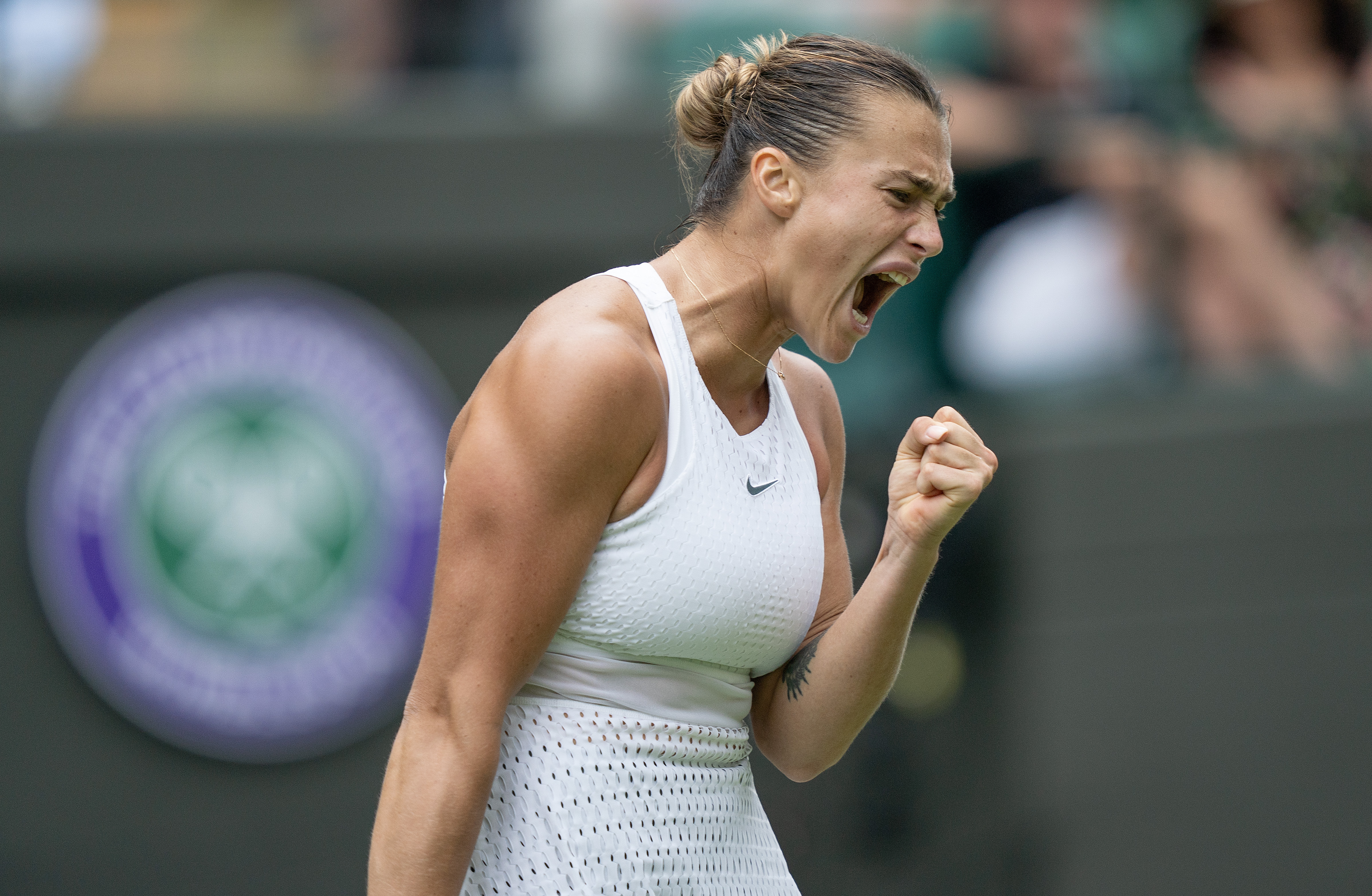 Jul 12, 2023; London, United Kingdom; Aryna Sabalenka celebrates winning her match against Madison Keys (USA) on day ten of Wimbledon at the All England Lawn Tennis and Croquet Club.