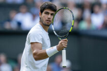 Jul 12, 2023; London, United Kingdom; Carlos Alcaraz (ESP) reacts to a point during his match against Holger Rune (DEN) on day ten of Wimbledon at the All England Lawn Tennis and Croquet Club.