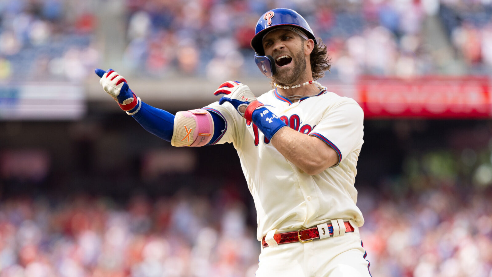 Jul 15, 2023; Philadelphia, Pennsylvania, USA; Philadelphia Phillies designated hitter Bryce Harper (3) reacts after hitting an RBI infield single during the eighth inning against the San Diego Padres at Citizens Bank Park.