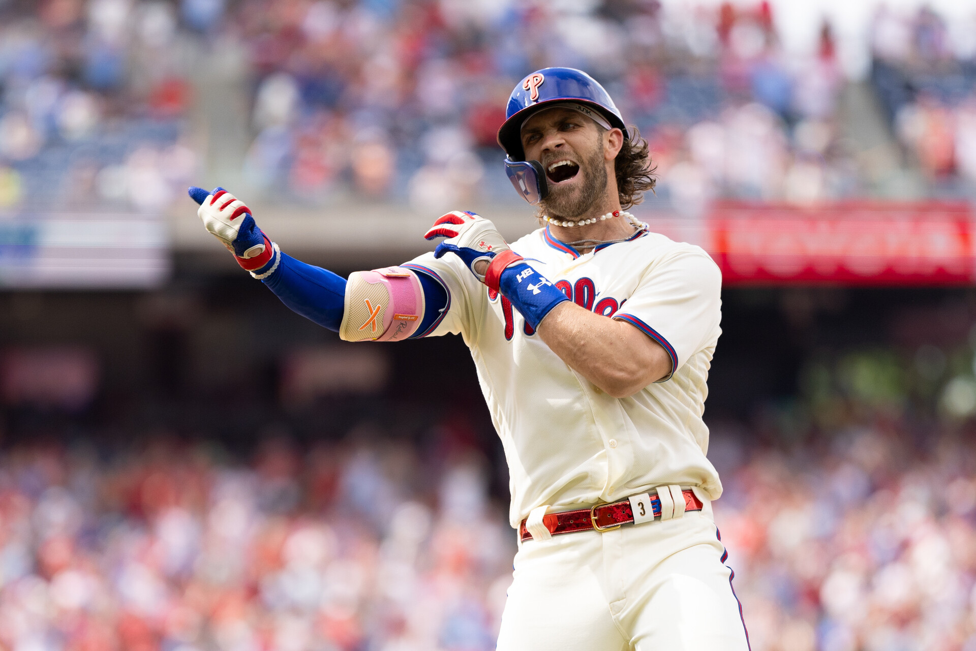 Jul 15, 2023; Philadelphia, Pennsylvania, USA; Philadelphia Phillies designated hitter Bryce Harper (3) reacts after hitting an RBI infield single during the eighth inning against the San Diego Padres at Citizens Bank Park.