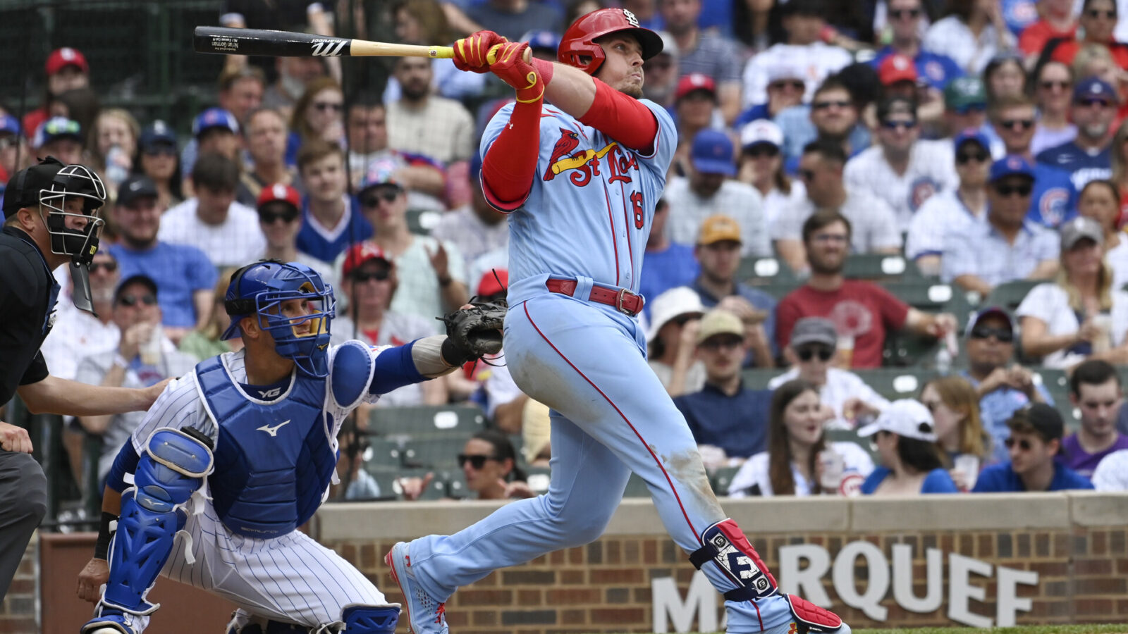 Jul 22, 2023; Chicago, Illinois, USA; St. Louis Cardinals second baseman Nolan Gorman (16) hits a solo home run against the Chicago Cubs during the fifth inning at Wrigley Field.