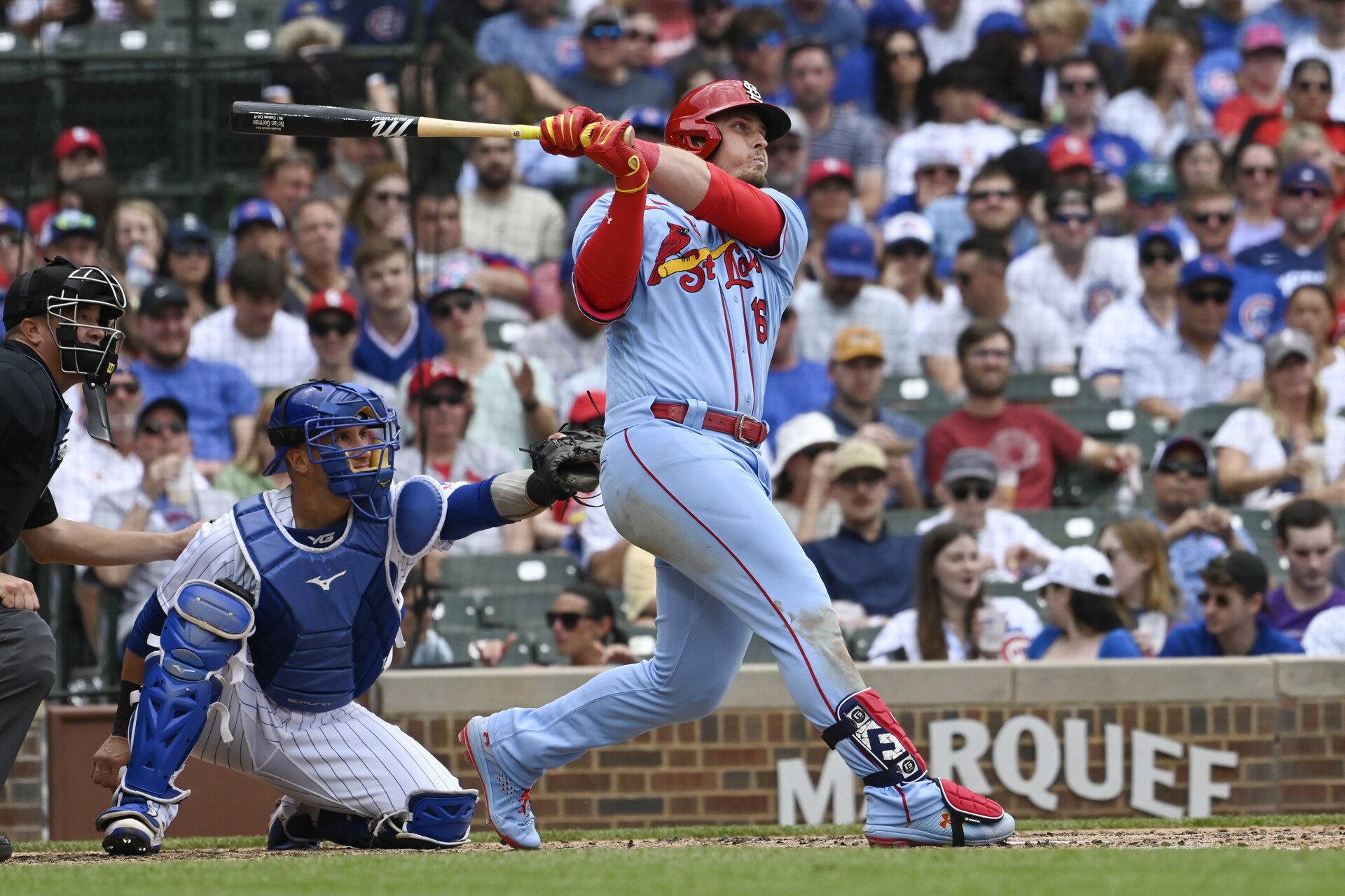 Jul 22, 2023; Chicago, Illinois, USA; St. Louis Cardinals second baseman Nolan Gorman (16) hits a solo home run against the Chicago Cubs during the fifth inning at Wrigley Field.