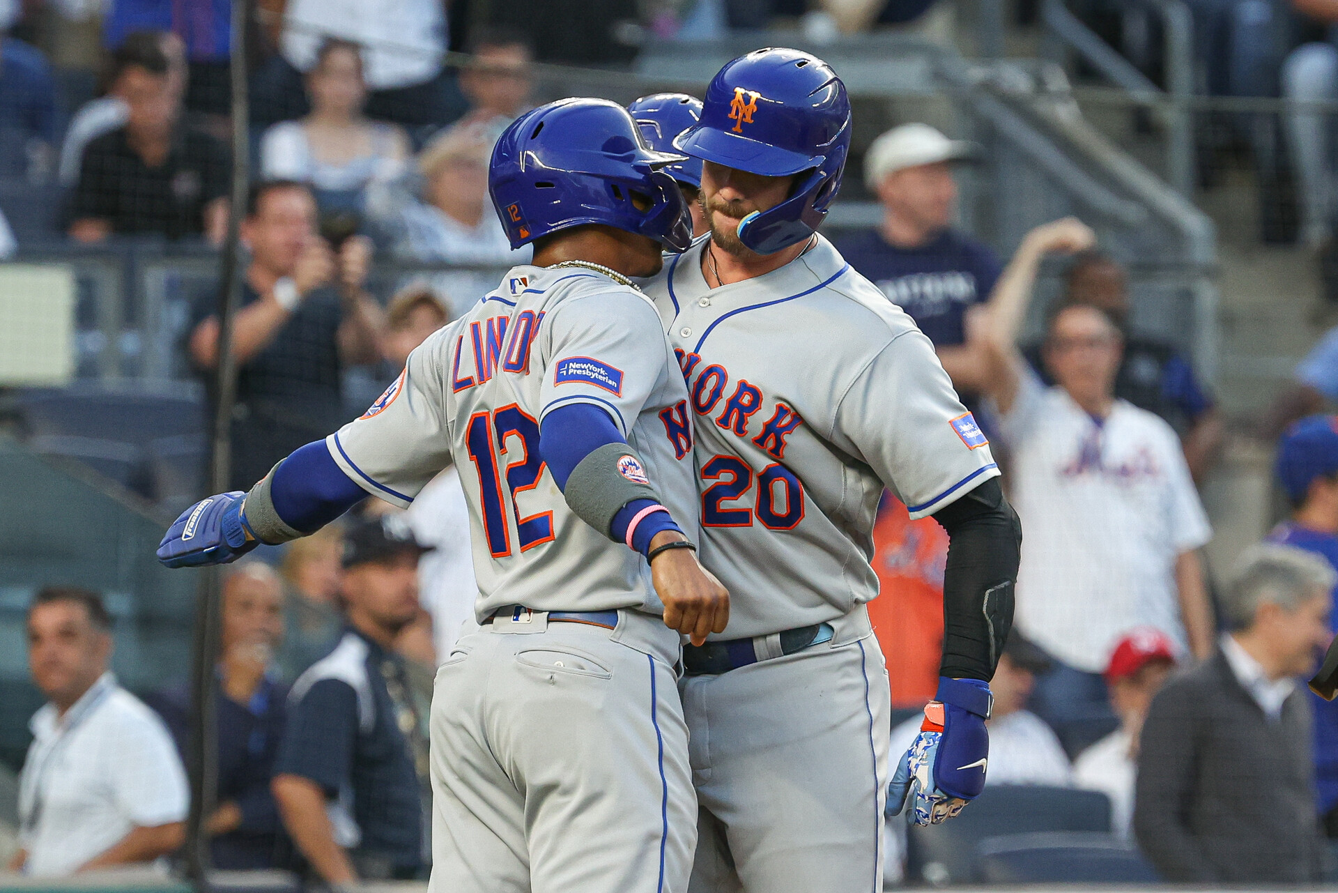 Jul 25, 2023; Bronx, New York, USA; New York Mets first baseman Pete Alonso (20) celebrates his three run home run with shortstop Francisco Lindor (12) and second baseman Jeff McNeil (1) during the third inning against the New York Yankees at Yankee Stadium.