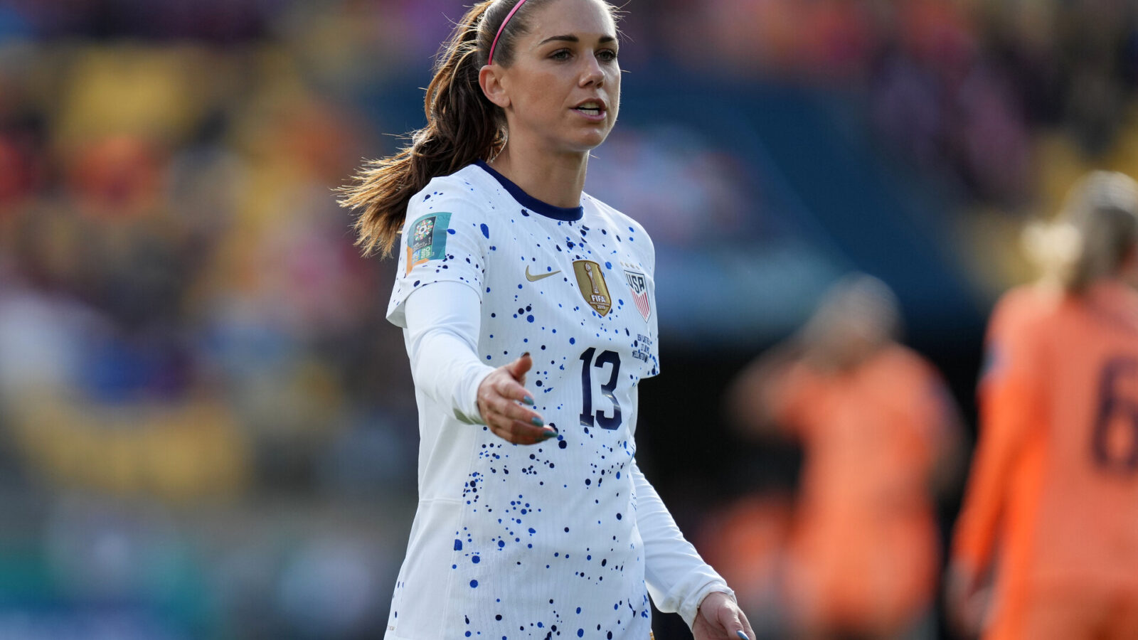 United States forward Alex Morgan (13) reacts against the Netherlands during the first half in a group stage match for the 2023 FIFA Women's World Cup at Wellington Regional Stadium.