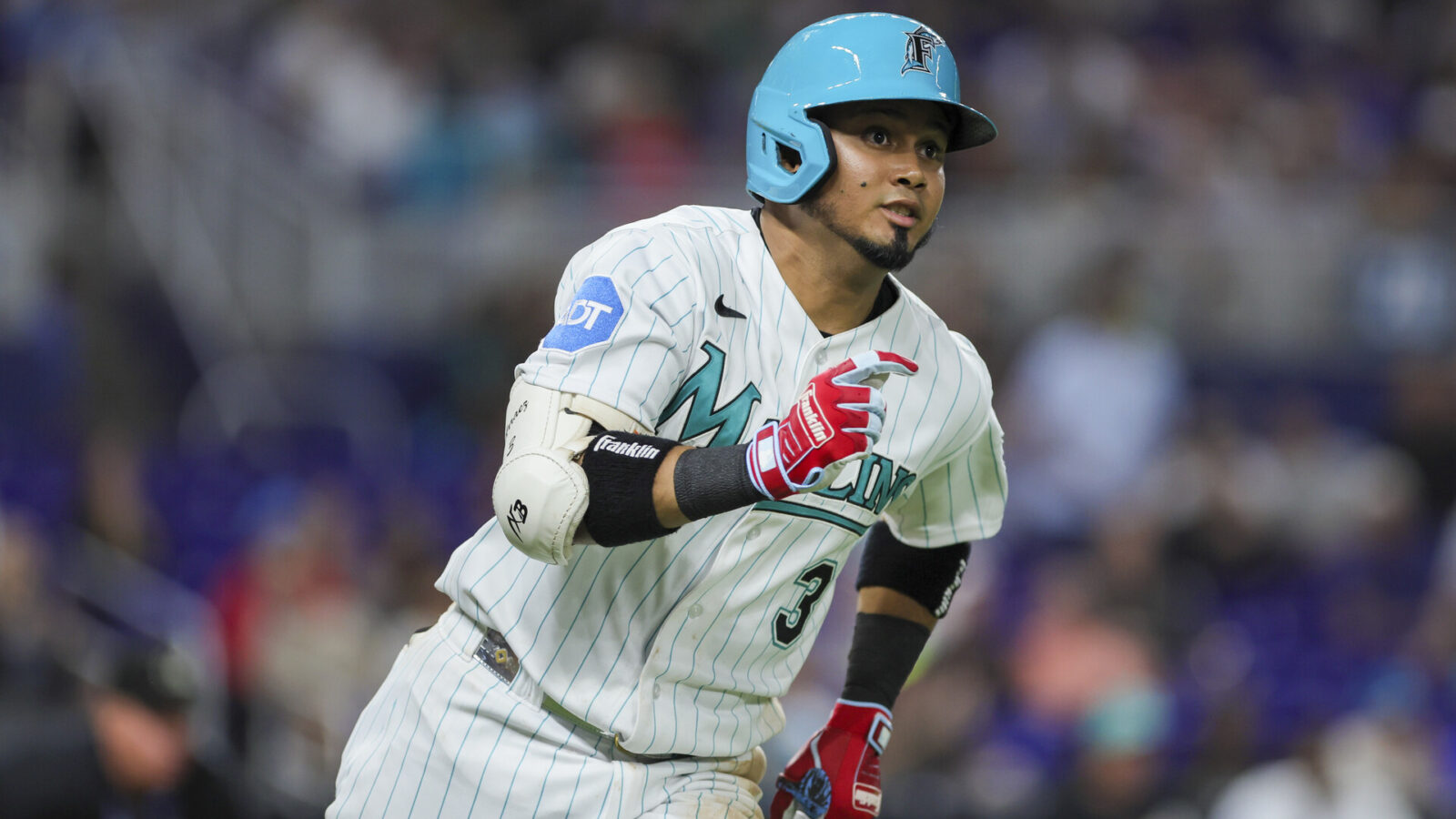 Miami Marlins second baseman Luis Arraez (3) runs toward second base after hitting a double against the Detroit Tigers during the seventh inning at loanDepot Park.