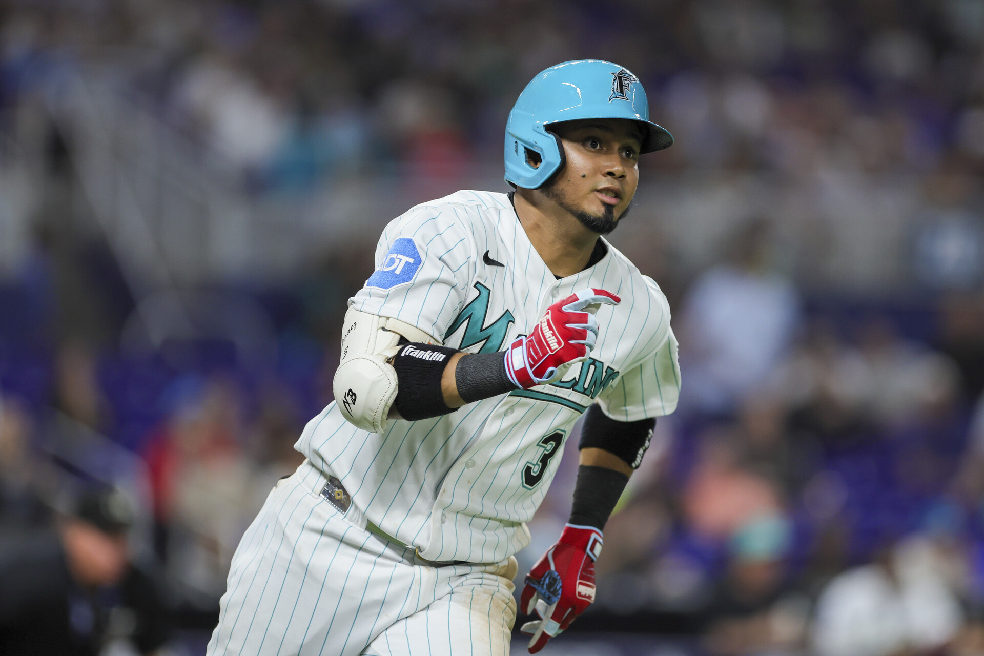 Miami Marlins second baseman Luis Arraez (3) runs toward second base after hitting a double against the Detroit Tigers during the seventh inning at loanDepot Park.