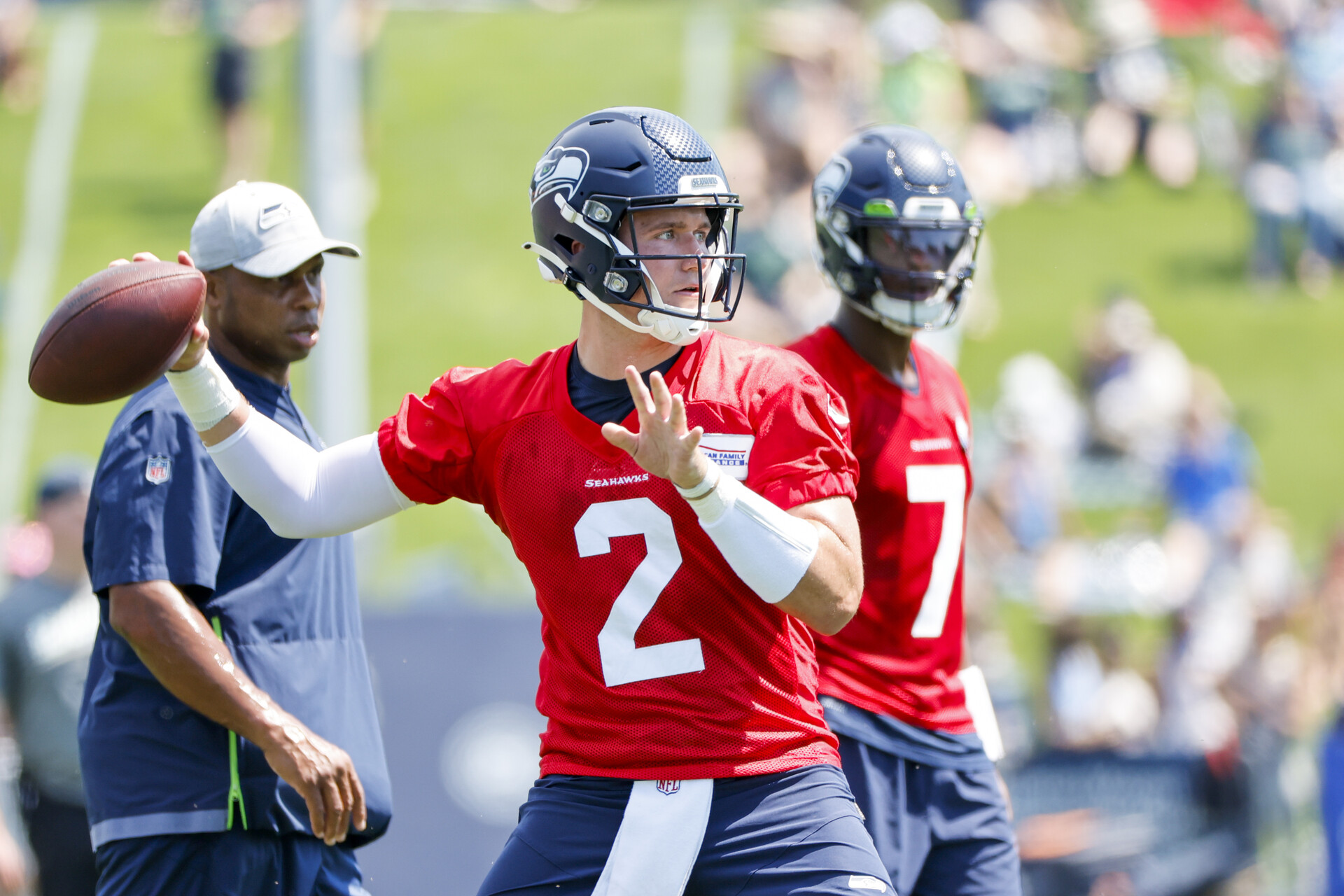 Seattle Seahawks quarterback Drew Lock (2) passes during training camp practice at Virginia Mason Athletic Center.