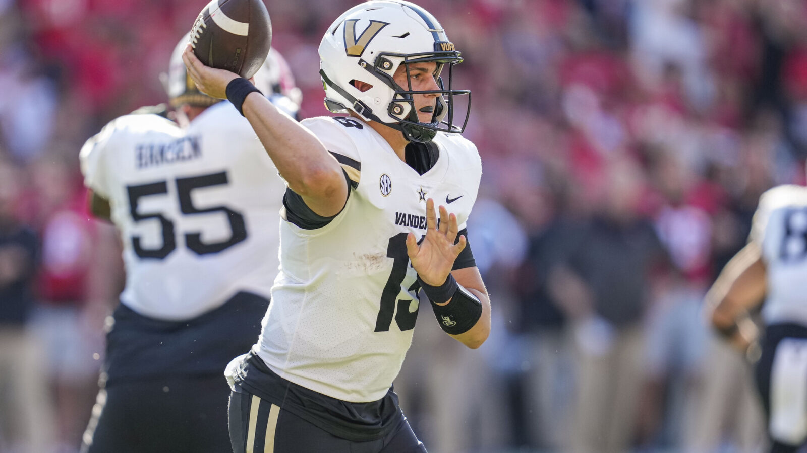 Vanderbilt Commodores quarterback AJ Swann (13) passes agains the Georgia Bulldogs during the first half at Sanford Stadium.