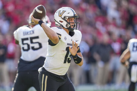 Vanderbilt Commodores quarterback AJ Swann (13) passes agains the Georgia Bulldogs during the first half at Sanford Stadium.