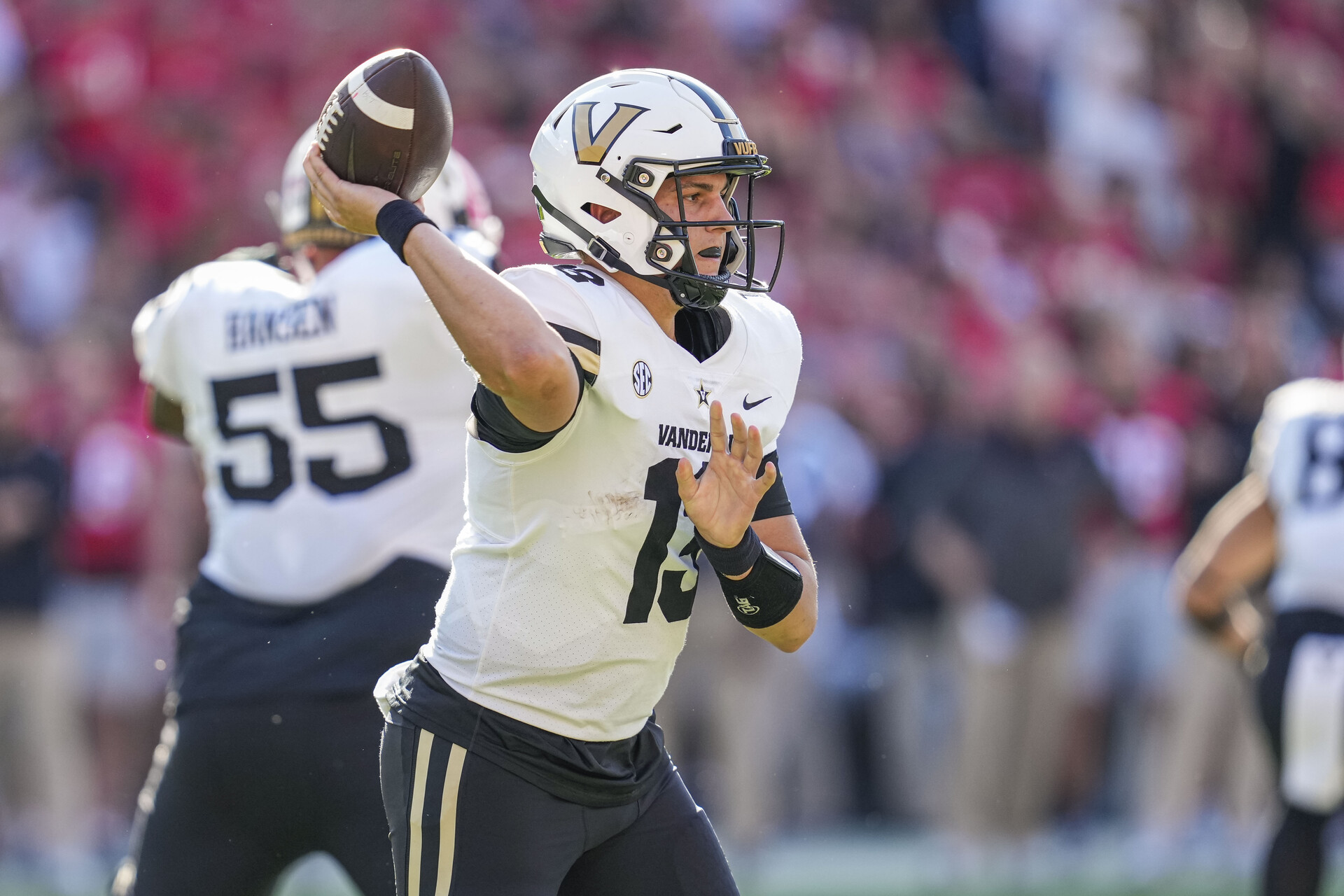Vanderbilt Commodores quarterback AJ Swann (13) passes agains the Georgia Bulldogs during the first half at Sanford Stadium.