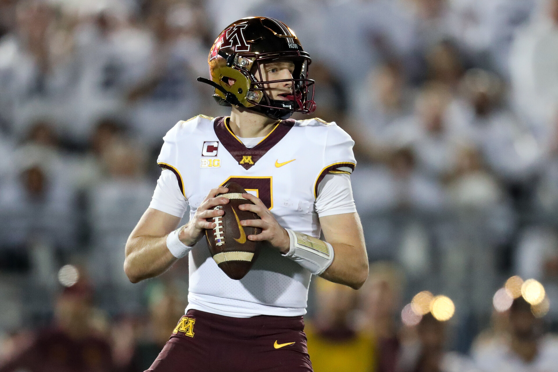 Minnesota Golden Gophers quarterback Athan Kaliakmanis (8) drops back in the pocket during the second quarter against the Penn State Nittany Lions at Beaver Stadium.