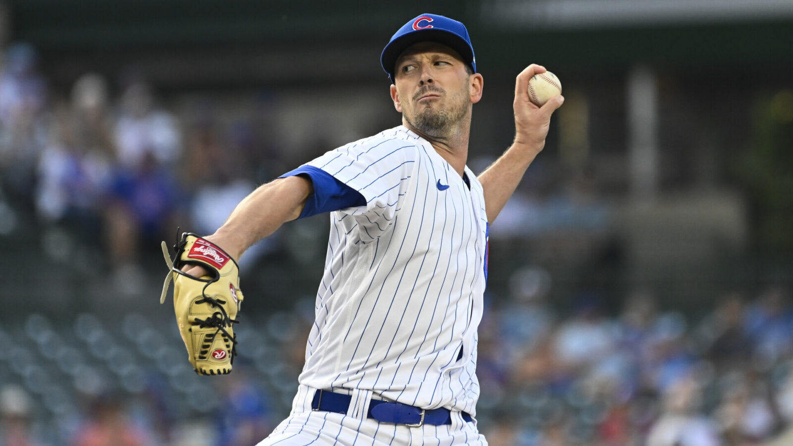 Jul 17, 2023; Chicago, Illinois, USA; Chicago Cubs starting pitcher Drew Smyly (11) delivers against the Washington Nationals during the first inning at Wrigley Field.