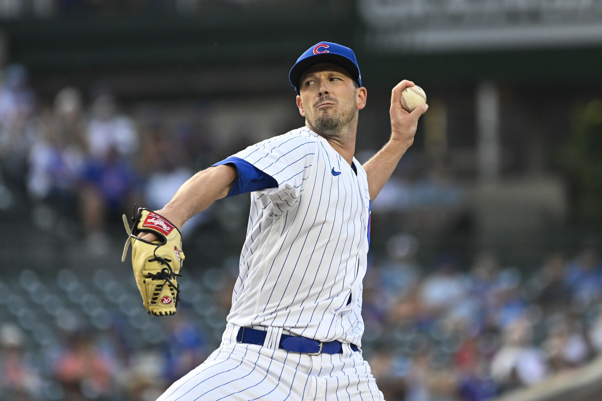 Jul 17, 2023; Chicago, Illinois, USA; Chicago Cubs starting pitcher Drew Smyly (11) delivers against the Washington Nationals during the first inning at Wrigley Field.