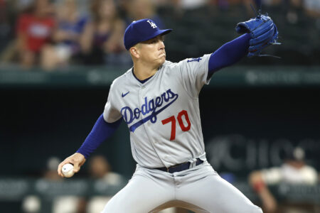 Jul 22, 2023; Arlington, Texas, USA; Los Angeles Dodgers starting pitcher Bobby Miller (70) pitches in the first inning against the Texas Rangers at Globe Life Field.