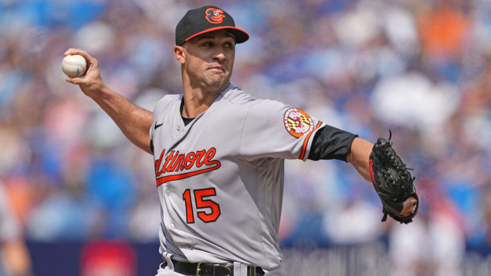 Aug 3, 2023; Toronto, Ontario, CAN; Baltimore Orioles starting pitcher Jack Flaherty (15) throws a pitch against the Toronto Blue Jays during the first inning at Rogers Centre.