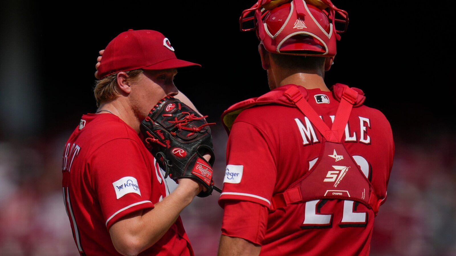 Cincinnati Reds starting pitcher Andrew Abbott (41) is visited at the mound by catcher Luke Maile (22) in the fourth inning of the MLB National League game between the Cincinnati Reds and the Washington Nationals at Great American Ball Park in downtown Cincinnati on Saturday, Aug. 5, 2023. The Nationals led 5-0 after four innings.