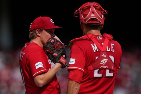 Cincinnati Reds starting pitcher Andrew Abbott (41) is visited at the mound by catcher Luke Maile (22) in the fourth inning of the MLB National League game between the Cincinnati Reds and the Washington Nationals at Great American Ball Park in downtown Cincinnati on Saturday, Aug. 5, 2023. The Nationals led 5-0 after four innings.