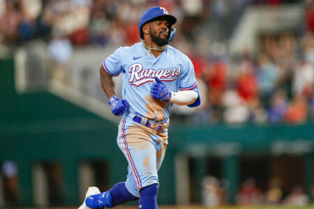 Aug 6, 2023; Arlington, Texas, USA; Texas Rangers right fielder Adolis Garcia (53) hits a home run during the eighth inning against the Miami Marlins at Globe Life Field.