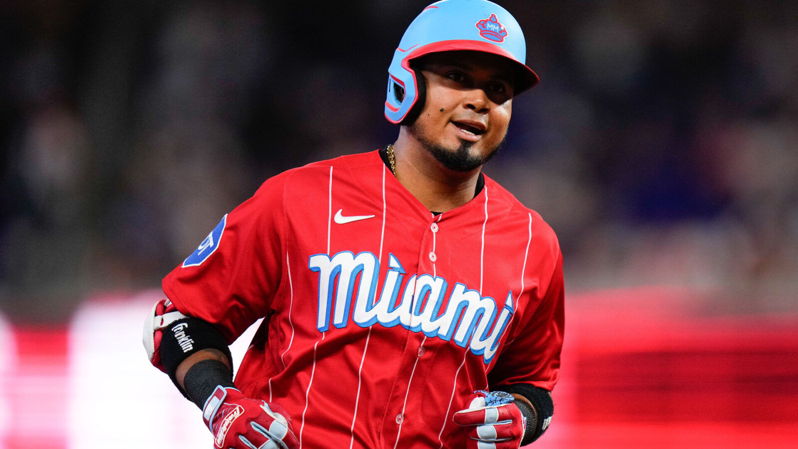 Aug 12, 2023; Miami, Florida, USA; Miami Marlins second baseman Luis Arraez (3) rounds the bases after hitting a two run home run against the New York Yankees during the first inning at loanDepot Park.