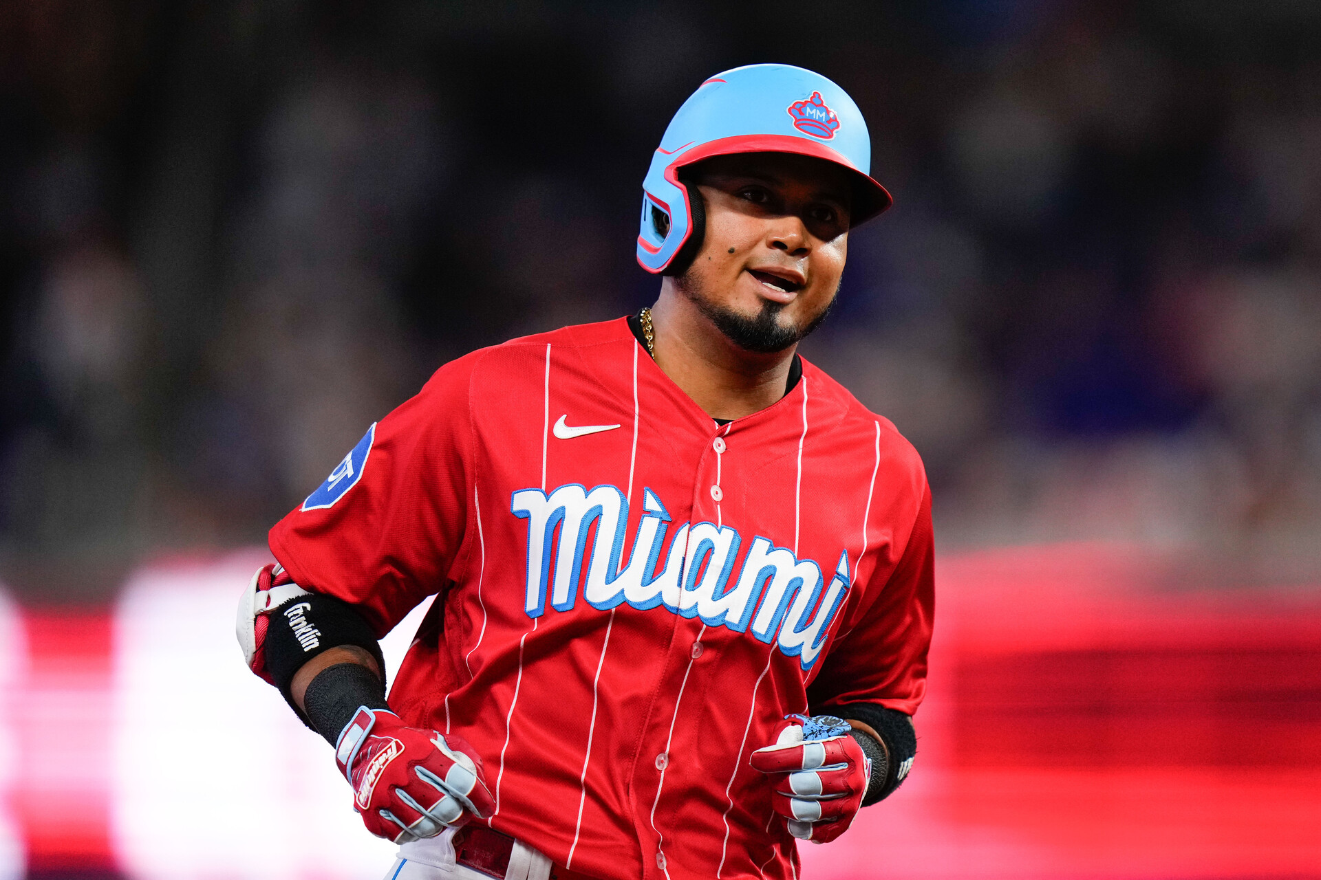 Aug 12, 2023; Miami, Florida, USA; Miami Marlins second baseman Luis Arraez (3) rounds the bases after hitting a two run home run against the New York Yankees during the first inning at loanDepot Park.