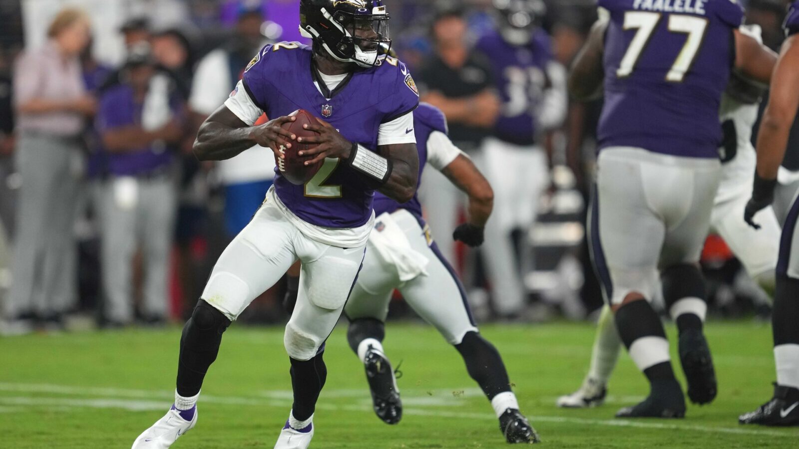 Baltimore Ravens quarterback Tyler Huntley (2) rolls out to pass in the third quarter against the Philadelphia Eagles at M&T Bank Stadium.