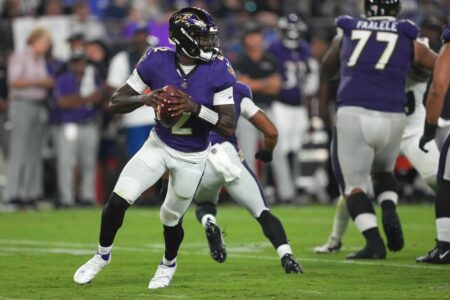 Baltimore Ravens quarterback Tyler Huntley (2) rolls out to pass in the third quarter against the Philadelphia Eagles at M&T Bank Stadium.