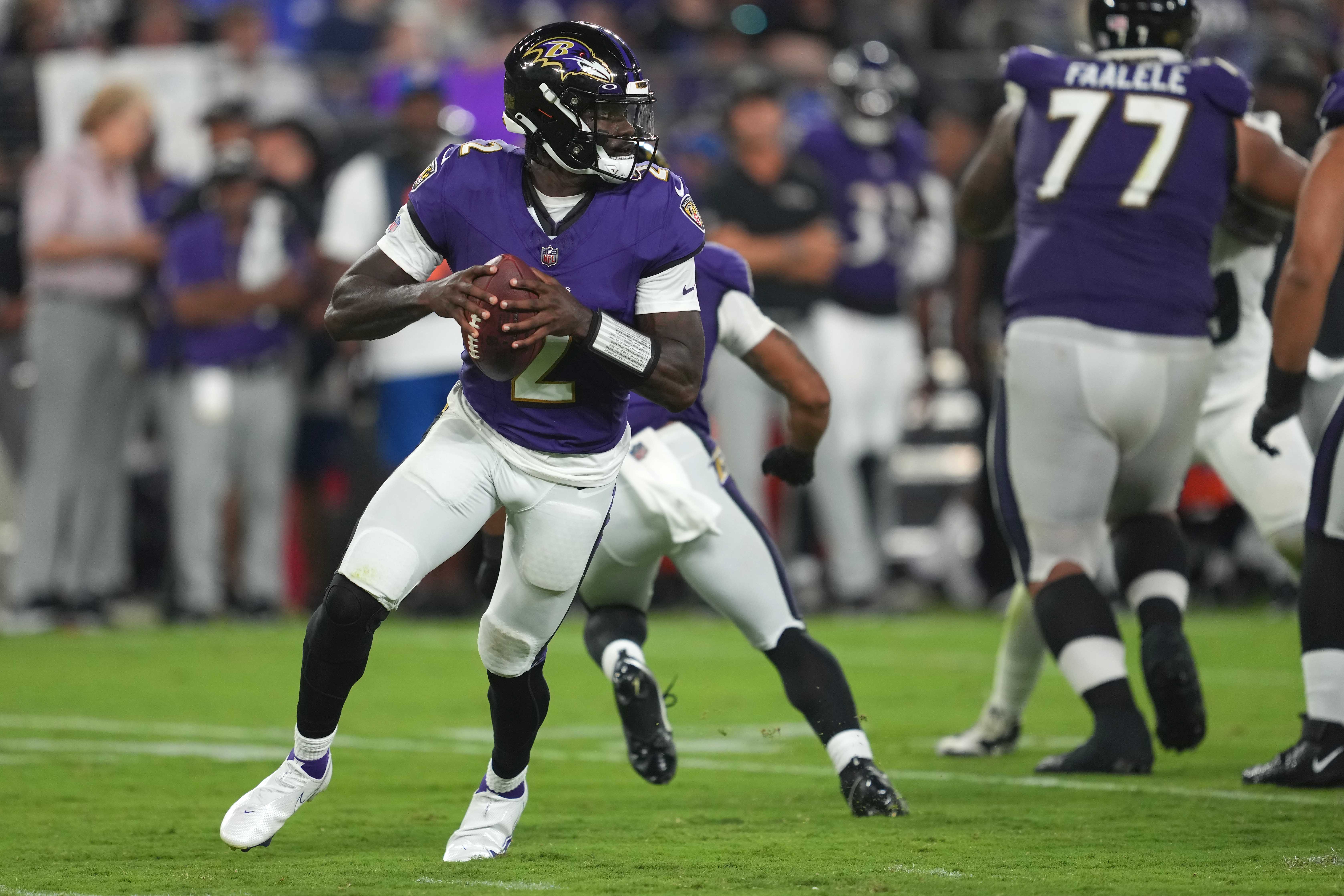 Baltimore Ravens quarterback Tyler Huntley (2) rolls out to pass in the third quarter against the Philadelphia Eagles at M&T Bank Stadium.