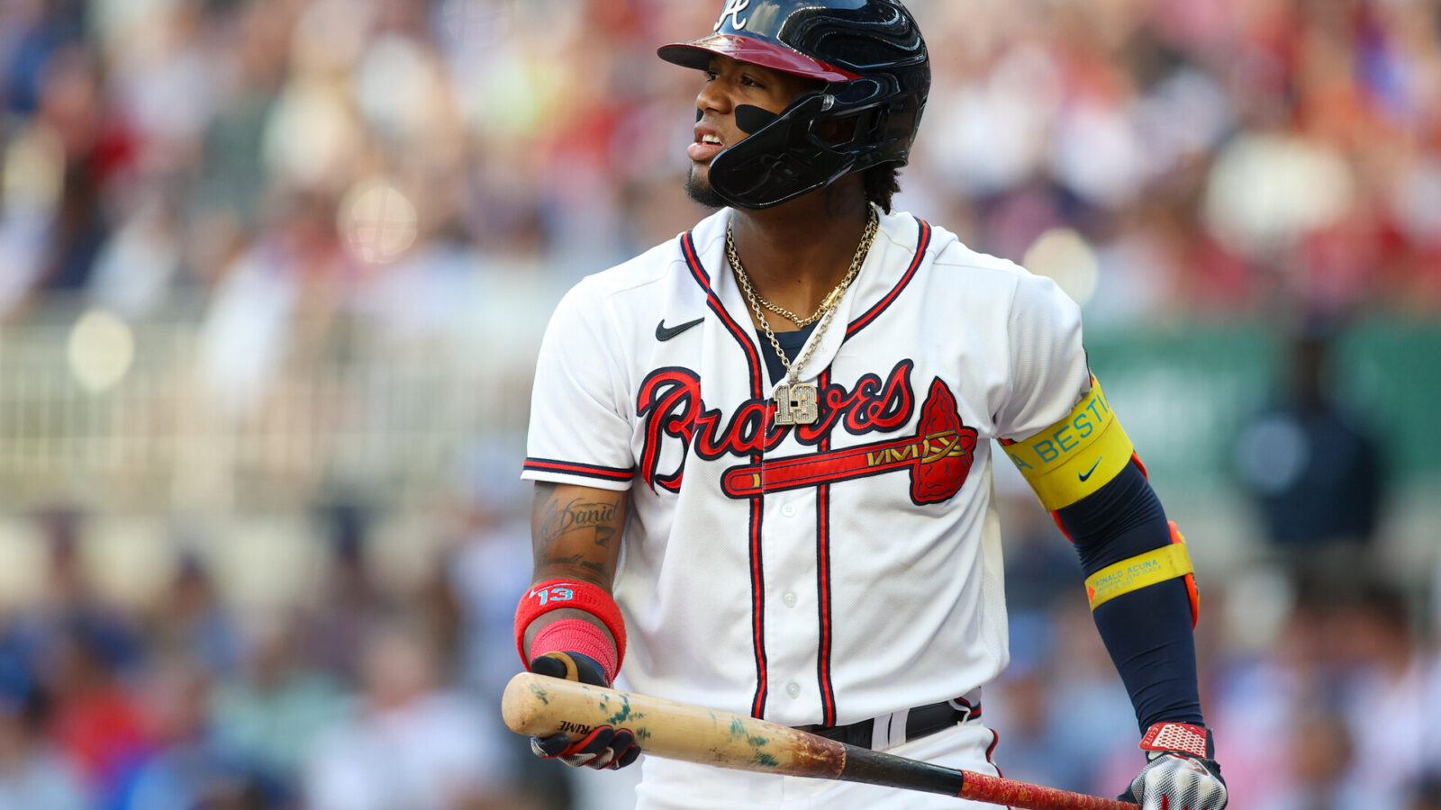 Aug 16, 2023; Atlanta, Georgia, USA; Atlanta Braves right fielder Ronald Acuna Jr. (13) reacts after a pitch against the New York Yankees in the first inning at Truist Park.