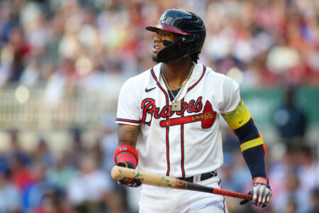 Aug 16, 2023; Atlanta, Georgia, USA; Atlanta Braves right fielder Ronald Acuna Jr. (13) reacts after a pitch against the New York Yankees in the first inning at Truist Park.